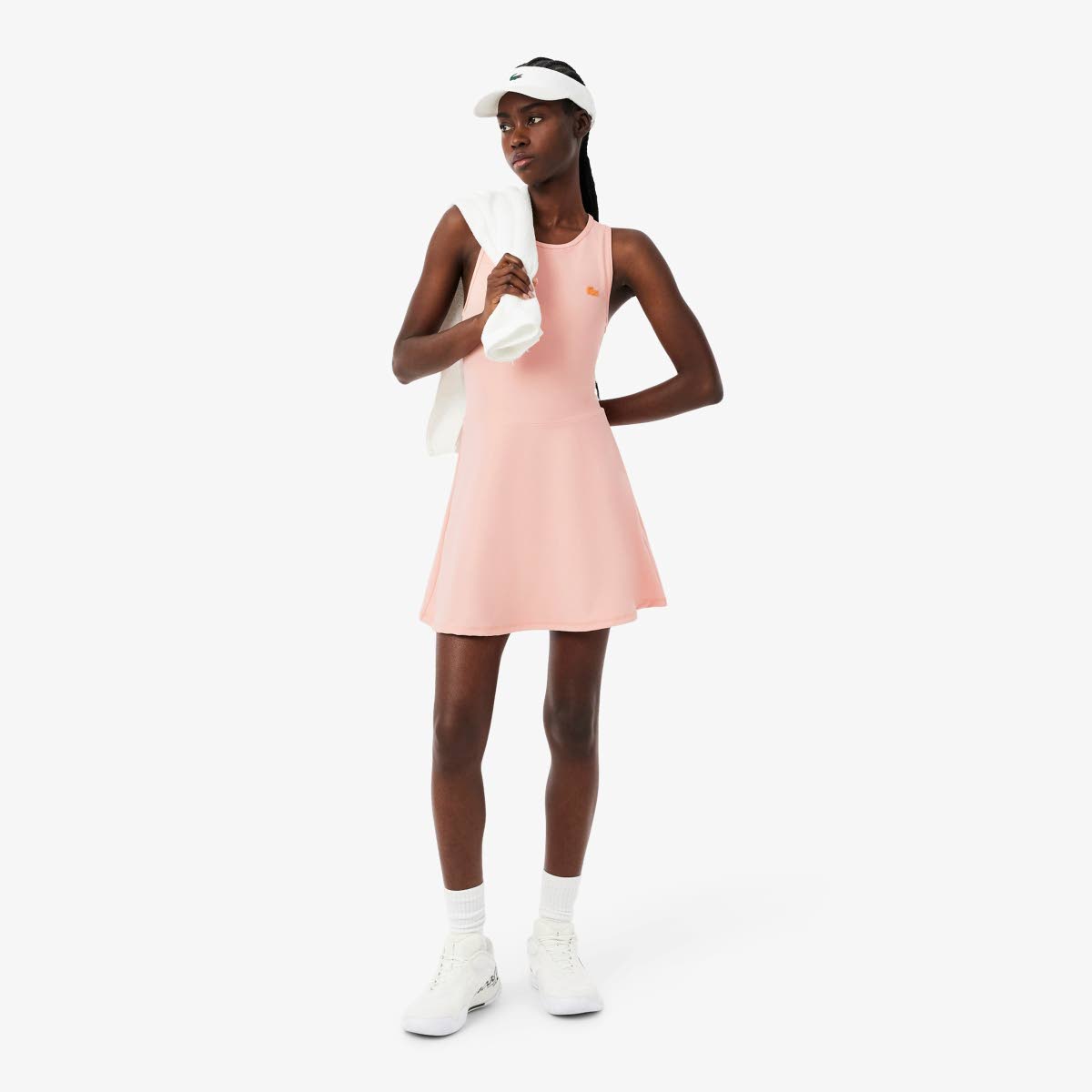 Perfect for a day on or off the court, Tomiwa shows how in an ultra sport dry dress and leather sneakers.