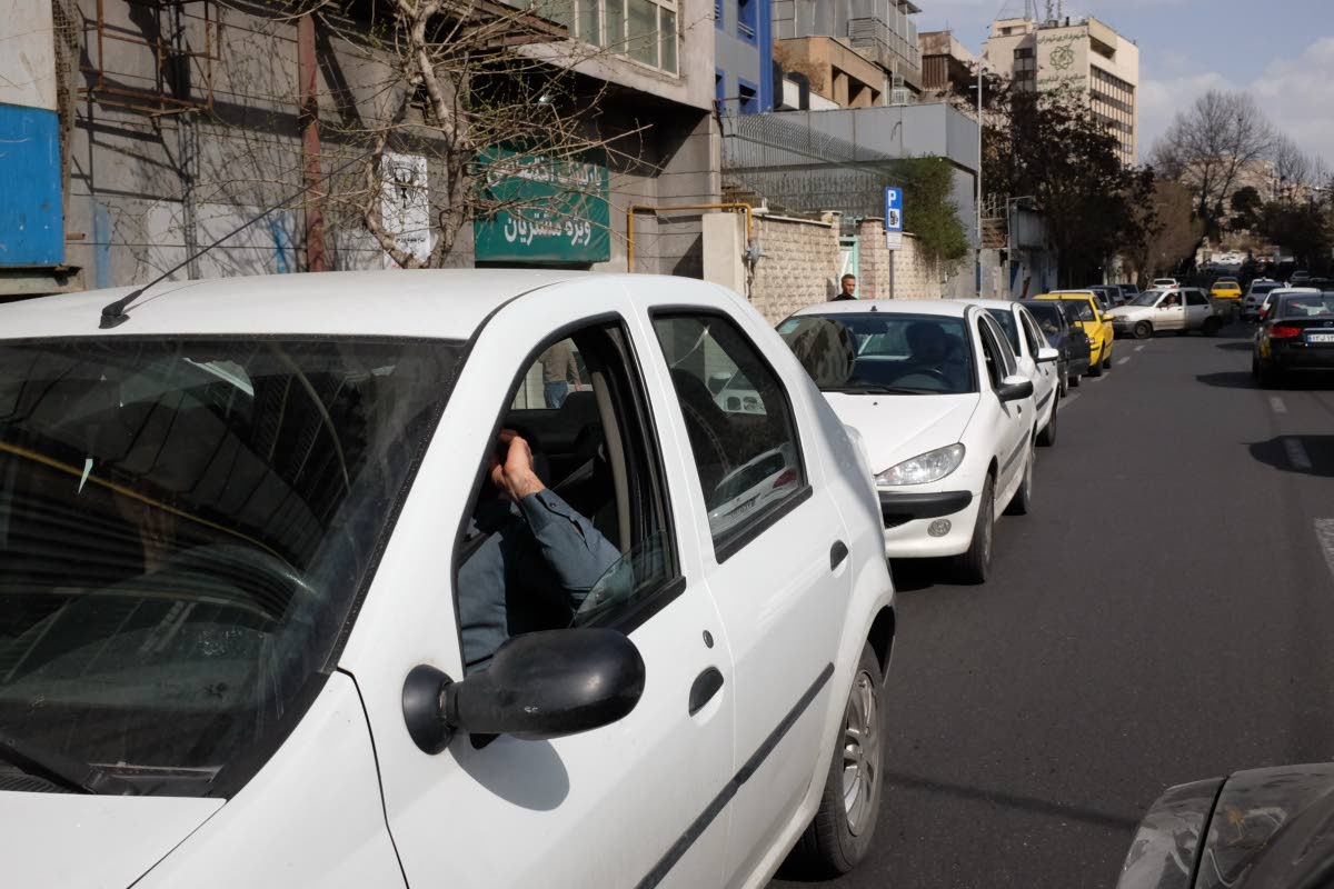 Vehicles queue outside a gas station following Israeli strikes in the city, in Tehran, Iran on February 28, 2026. 