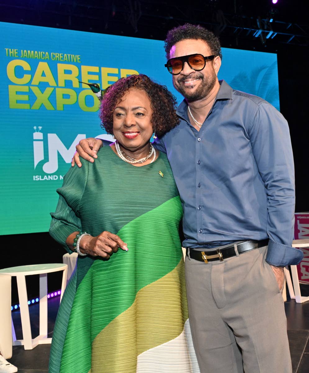 Minister of Culture, Gender, Entertainment and Sport Olivia Grange (left) and Orville ‘Shaggy’ Burrell, founder and chairman of the Island Music Conference.