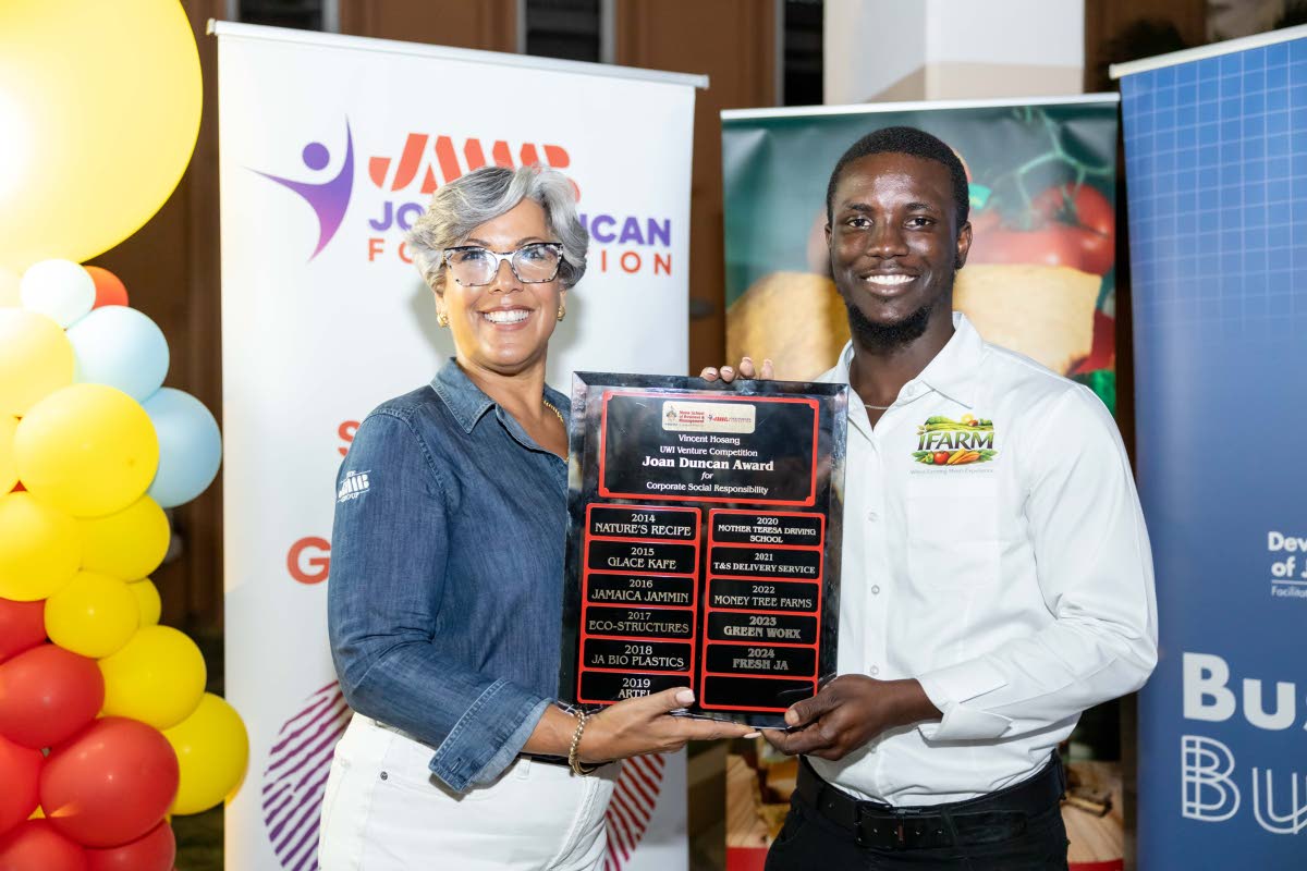 CEO of the JMMB Joan Duncan Foundation, Kim Mair (left), presents the Joan Duncan Award for Corporate Social Responsibility to IFARM during the 2025–26 Awards Ceremony of the Vincent HoSang UWI Venture Competition. 