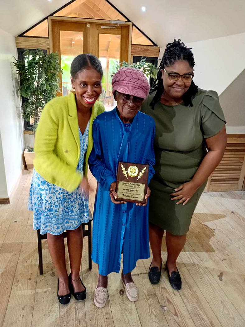 Agnes Johnson (centre) with project lead Cienna Smith (left) and team member Antonio Armstrong.