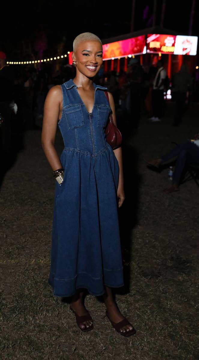  Shanon Johnson, owner of S’Maria Nails, decides on a midi denim dress for the occasion.