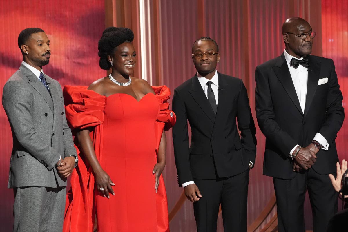 Delroy Lindo (right), who is of Jamaican roots, is joined by ‘Sinners’ castmates (from left) Michael B. Jordan, Wunmi Mosaku and Miles Caton, during the 32nd Annual Actor Awards on Sunday at the Shrine Auditorium and Expo Hall in Los Angeles. 