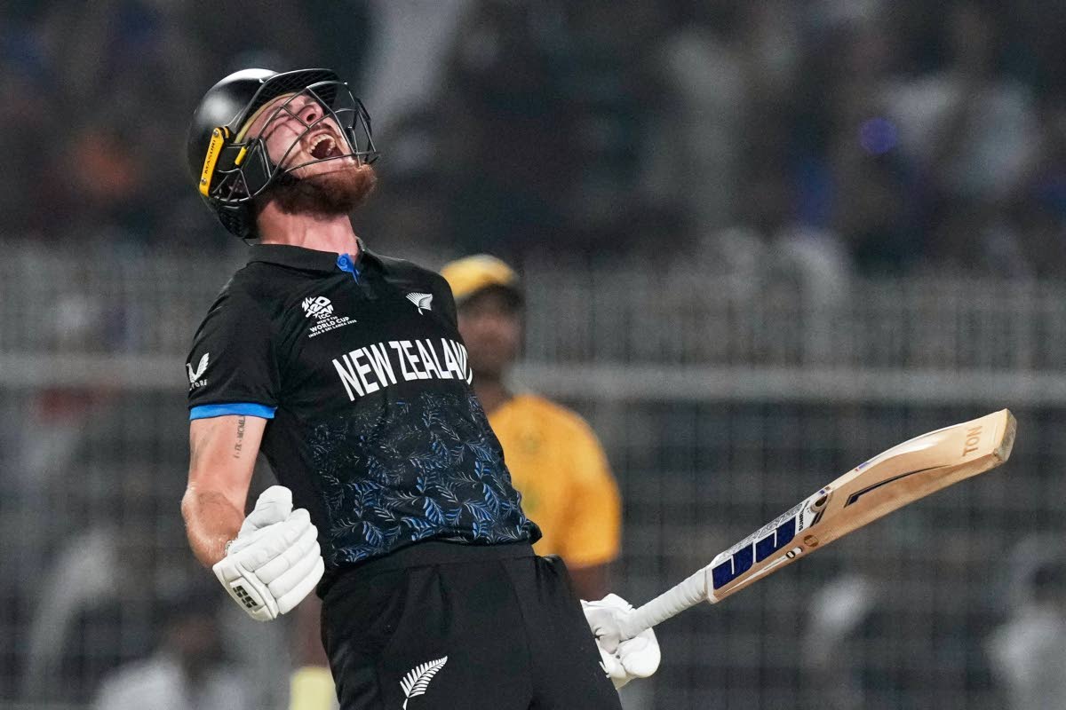 New Zealand’s Finn Allen reacts after hitting the winning runs and finishing his century during the first T20 World Cup semi-final match against South Africa in Kolkata, India, yesterday.