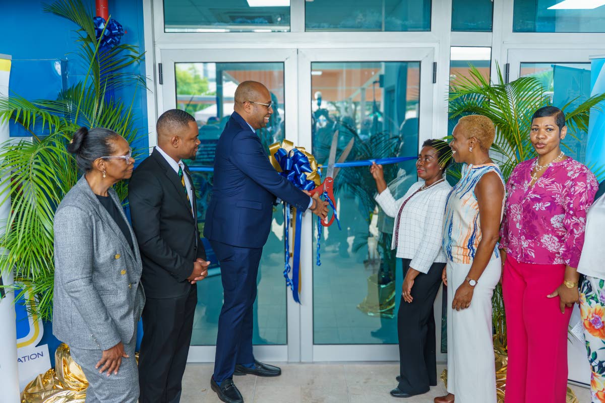 From left: Acting Vice-President at JAMPRO, Gail Barrett; Kingston Free Zone Director, Demoy Kerr; Minister of State in the Ministry of Industry, Investment and Commerce, Delano Seiveright; Vice-President of BPO and Logistics at the Port Authority of Jamai