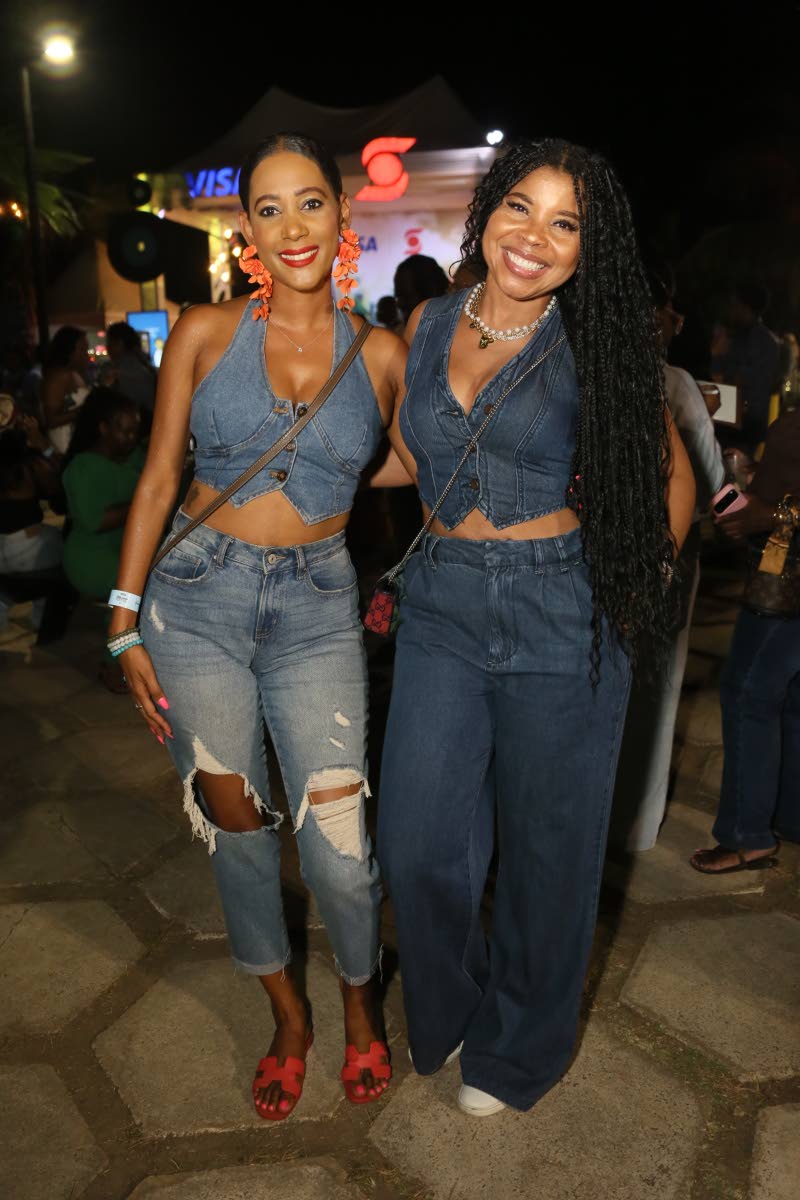 Anneka Bynes (left), manager of wealth management, NCB Capital Markets, and Simone Hull, marketing manager, Scotia Wealth Management, enjoy good food and matching denim styles.