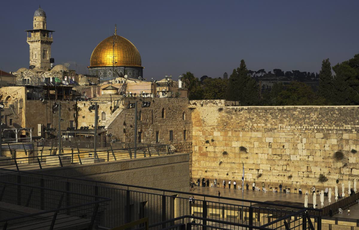 Jews pray at the Western Wall, beside the Temple Mount, known to Muslims as the Noble Sanctuary, or the Al-Aqsa Mosque compound, in the Old City of Jerusalem, Monday, Oct. 16, 2023. 
