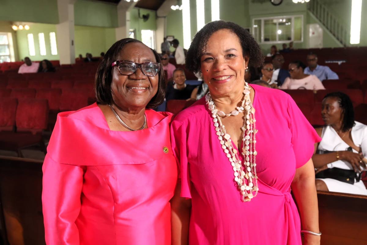 Bishop Paulette Watt (left), Montego Bay-based customs broker and vice-president of CBFFAJ, with Corah Ann Sylvester, president of Shipping Association of Jamaica. Seated in the background is Ann Brown Chang, CBFFAJ vice-president.