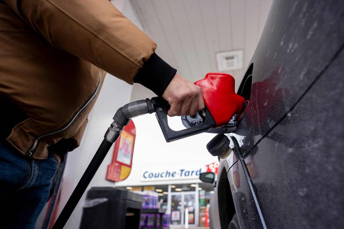 A person fills up their car at a gas station in Montreal on March 5, 2026. (Christopher Katsarov /The Canadian Press via AP)