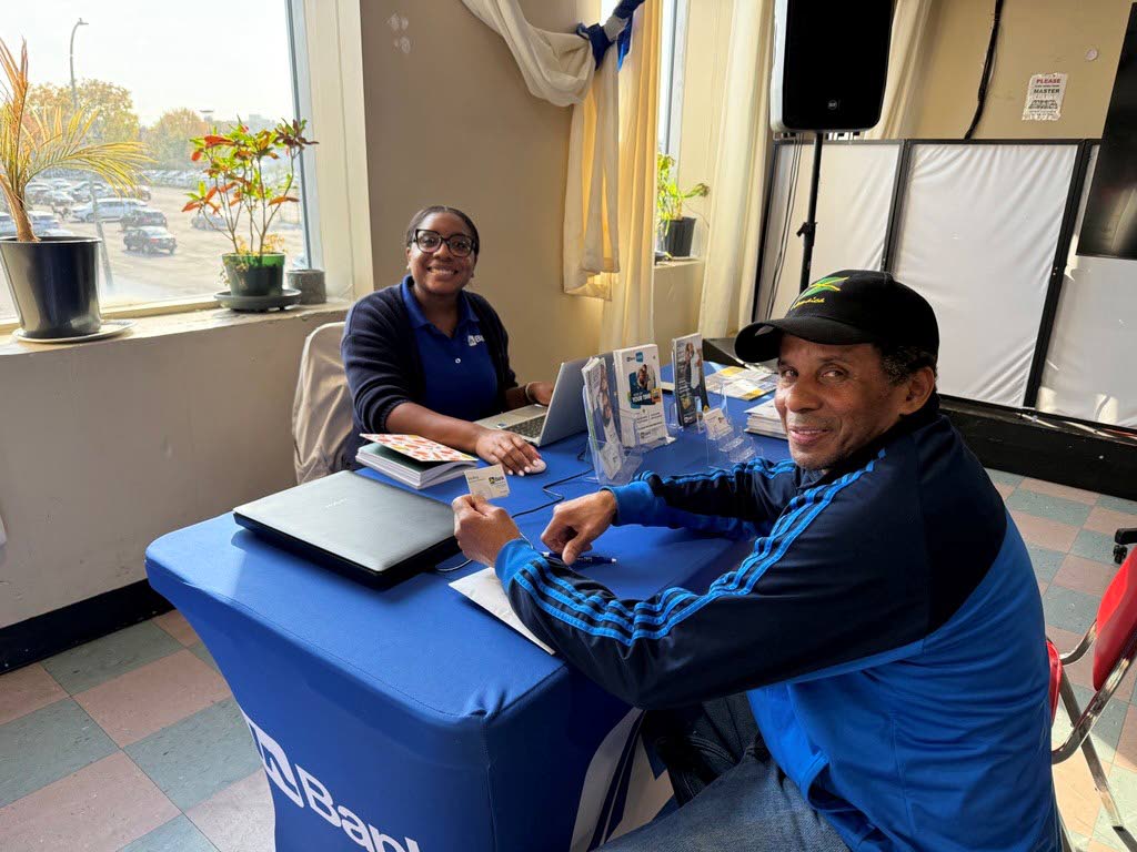 Monique Broughton, chief representative officer at the JN Bank Canada Representative Office, shares a photo with a JN Bank member in Montréal, Canada, recently.