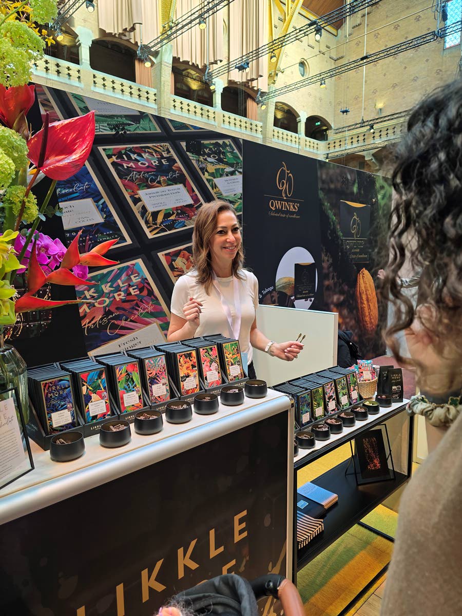Nadine Burie from Likkle More Chocolate showcases samples of chocolate products manufactured in Jamaica.