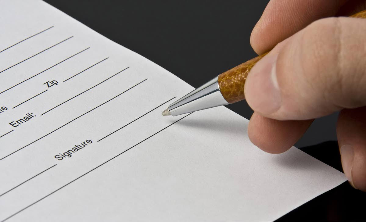 Signing the document