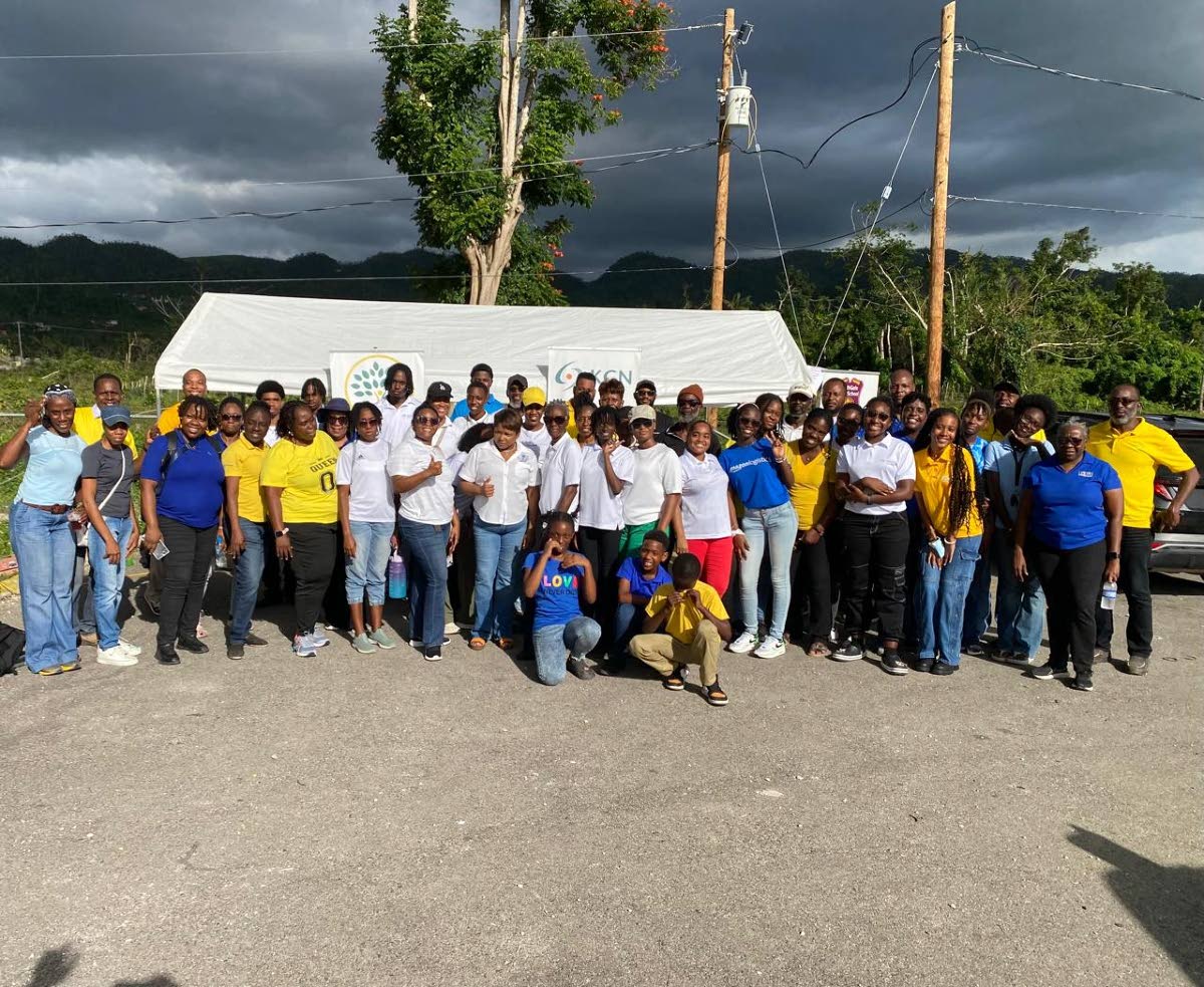 Volunteers with the NorthGate Youth and Family Development Foundation’s Operation GRACE initiative in Cambridge, St James, pose together for a group shot outside the Cambridge Health Centre in the community on March 7, during the official start of Operat