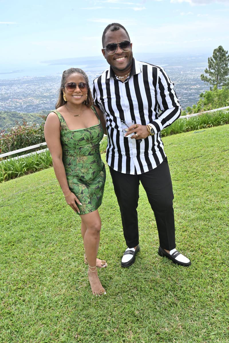 Samara South, public affairs and government relations Manager of J. Wray and Nephew and her colleague Garfene Grandison, corporate communications manager, soak up the Sunday sun. 