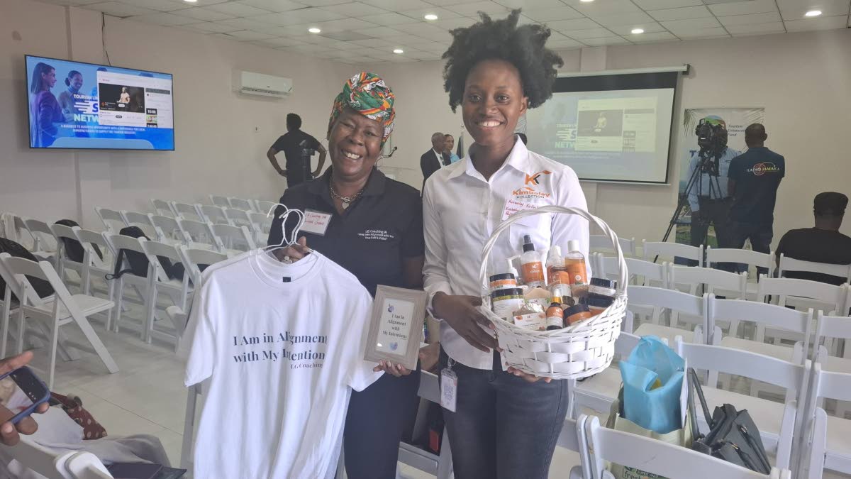 Lorraine Givans (left), of LG Coaching JA, and Kimboley Parkinson Poyser, owner of Kimboley Kollection, at the speed networking forum. 