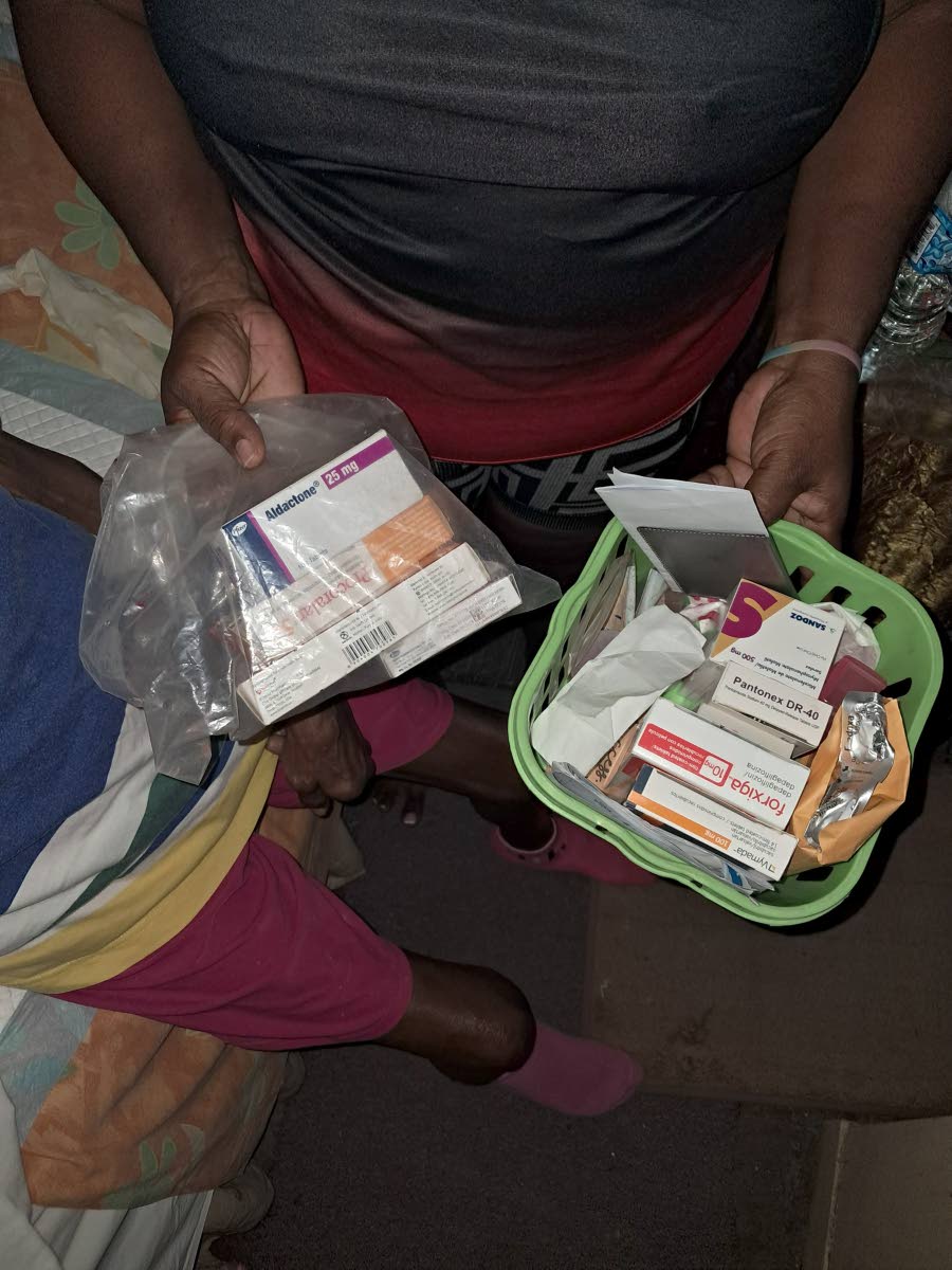 Sharon Burgess* shows some of her elderly mother’s medications. 