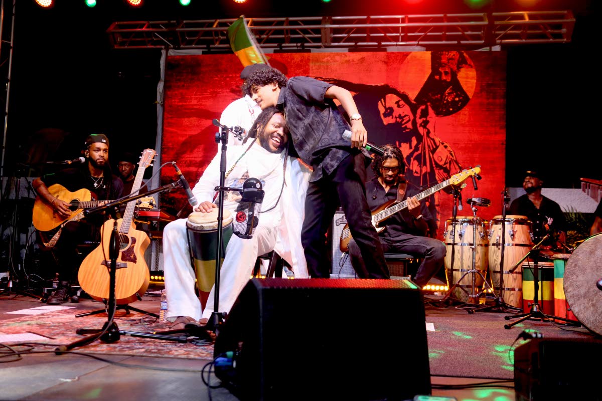 Elijah Marley embraces his uncle Stephen Marley during the tribute concert for Joseph ‘Jo Mersa’ Marley.