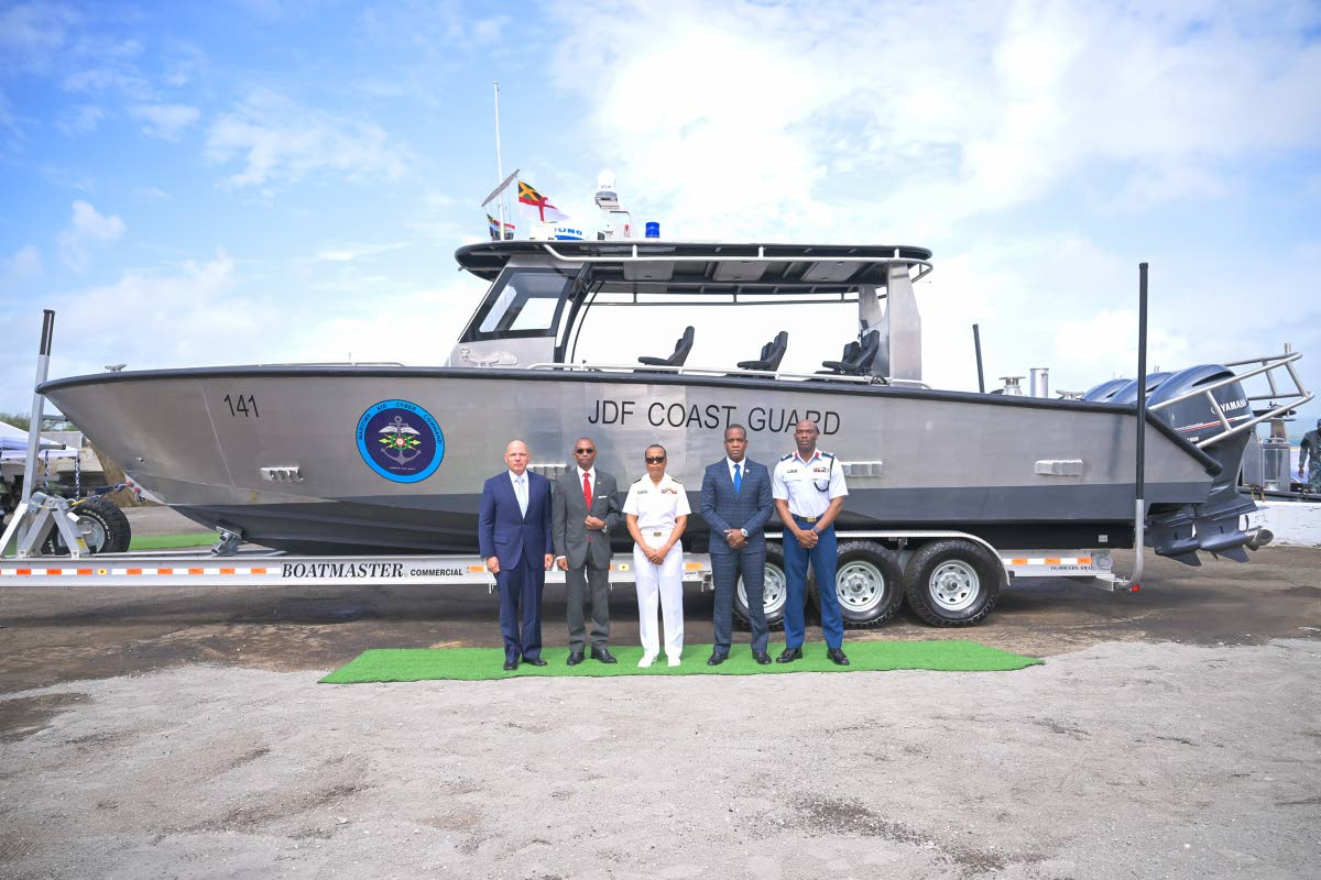 Chief of Defence Staff, Vice Admiral Antonette Wemyss-Gorman (centre), shares a photo opportunity with (from left) Senior Vice President, Metal Shark, Henry Irizarry; Permanent Secretary in the Office of the Prime Minister, Ambassador Rocky Meade; Commissi