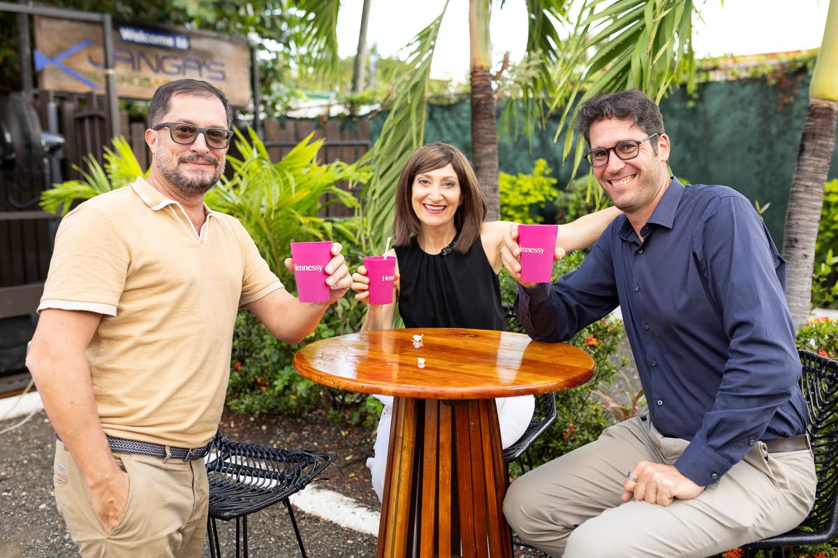 From left: Paul Auriol, managing director, Central America and Caribbean, Moët Hennessy; President of Latin America and the Caribbean Régine Erviti, and General Manager Alexandre Helaine, toast to the official partnership between Hennessy and Yard Mas Ca