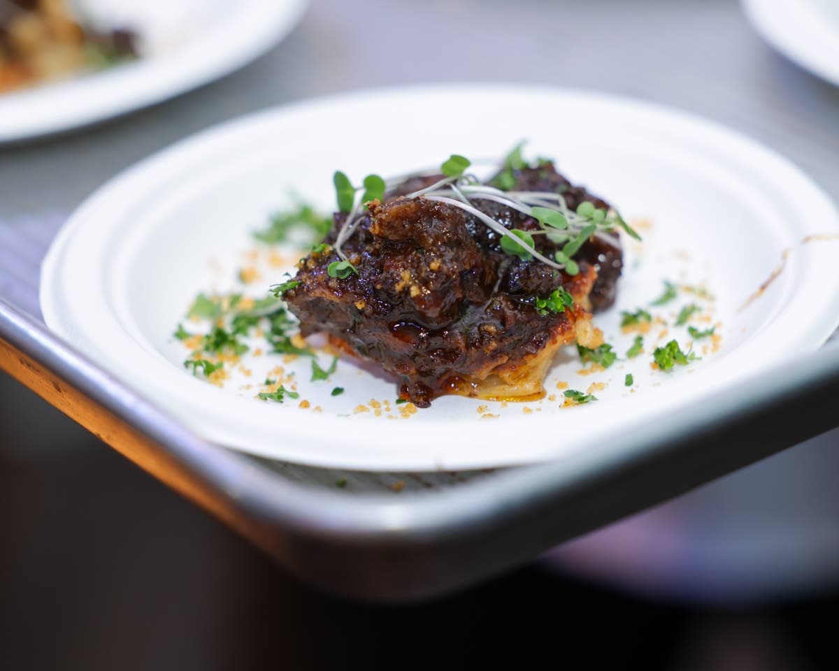 Chef Scotley Innis transforms tradition into culinary artistry with his oxtail pavé.