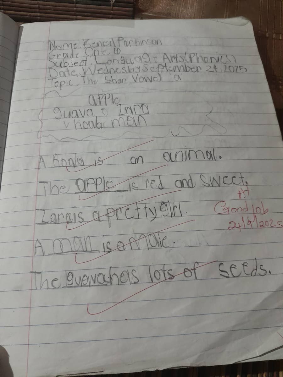 left: Seven-year-old Keneil Parkinson proudly displays his classwork, reflecting his strong academic performance despite physical challenges.