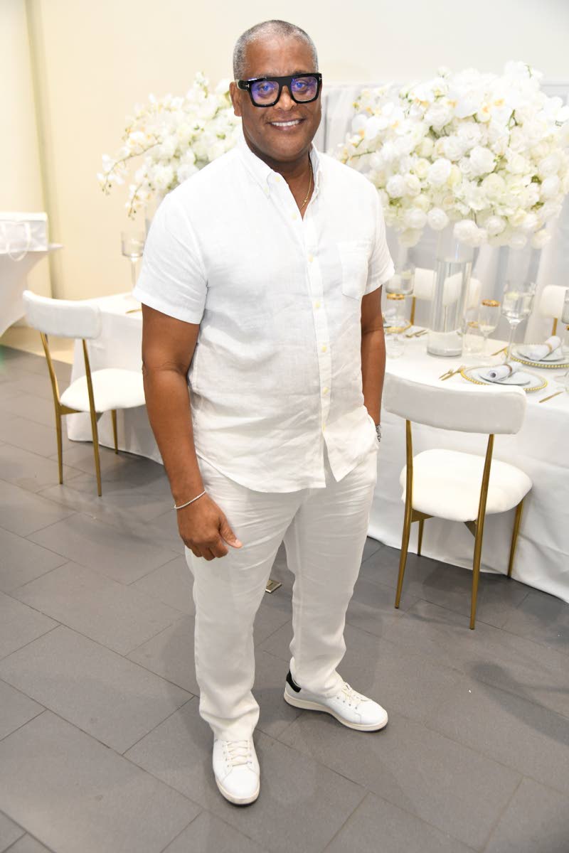 Brian Sang, general manager of The Jamaica Pegasus, embraces the evening’s all-white dress code, keeping it cool yet comfortable.