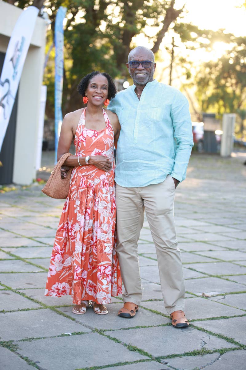 Orville Nembhard and his wife, Denese, share a sweet moment.