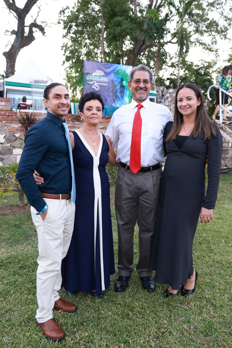The Ross family came together in style to celebrate 25 years of Sterling! Posing for the lens are Charles Ross (second right), president and chief executive officer; his wife, attorney-at-law, Natalie Farrell-Ross (second left); and children Andrew Ross (l