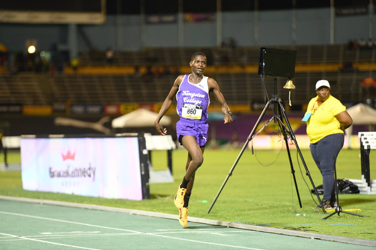 Kingston College’s Julius Itubo crosses the finish line to win the boys' Class Three 1500m final at the ISSA/GraceKennedy Boys and Girls’ Athletics Championships on March 25, 2026. He set new record of 4:00.76. (Antoine Lodge photo)