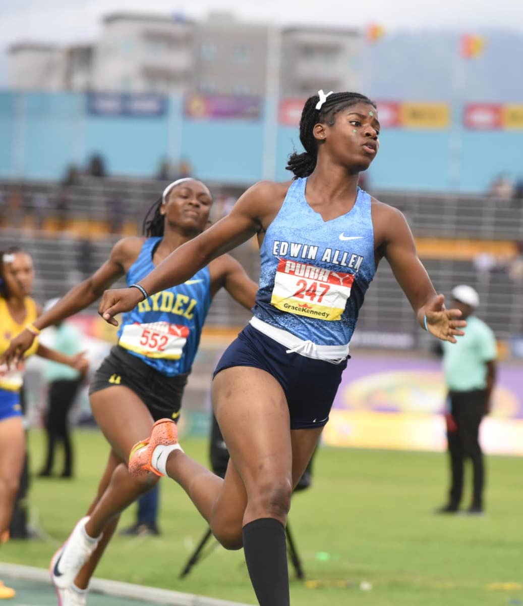 Edwin Allen High's Tashana Godfrey crosses the line in 10.75 seconds during the Class Three 80m hurdles semifinals at Champs. The time is below the record but will not be recognised because of the wind- assisted. (Ian Allen photo)