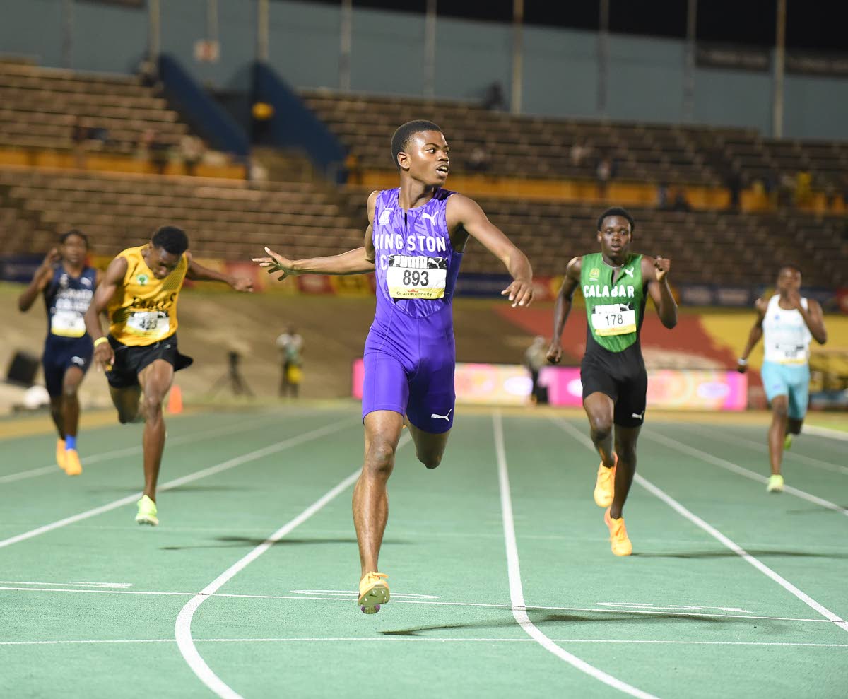 Jason Pitter (center) from Kingston College