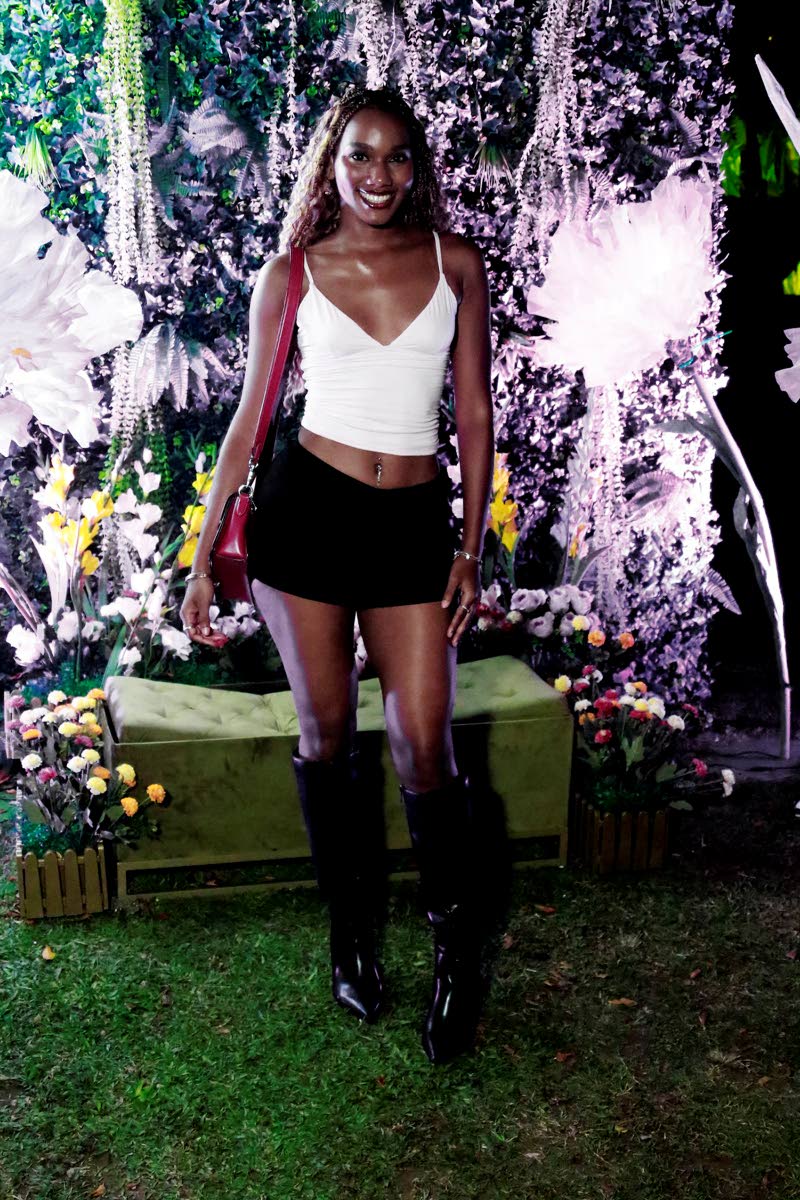 Chante-Marie Samlal is ready to fête in thigh-high boots.