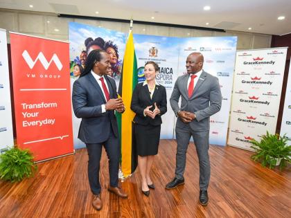 Elon Parkinson (right), head of communications and corporate affairs at Digicel, engages in conversation with Senator Kamina Johnson Smith, minister of foreign affairs and foreign trade, and State Ministe Alando Terrelonge during the media launch for the 1