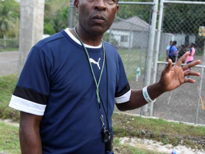 Michael Dyke, coach of the Edwin Allen High girls’ track and field team.