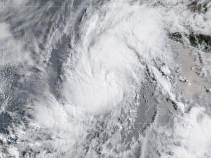 The weather service predicted little change in strength over the next couple of days but said the storm could intensify over the weekend.