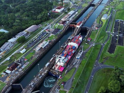 A cargo ship traverses the Agua Clara Locks of the Panama Canal in Colon, Panama.