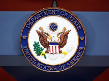 The seal of the State Department is photographed at the Washington Passport Agency, July 12, 2016, in Washington. (AP Photo/Alex Brandon, File)