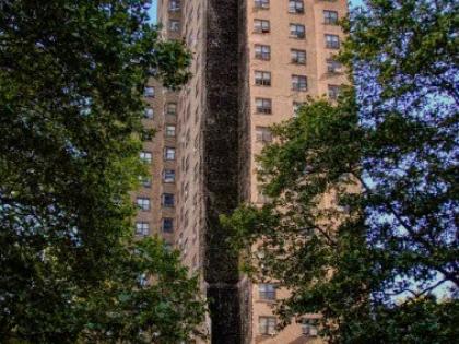 Firefighters work near the site of a building collapse in the Bronx borough of New York, Wednesday, October 1, 2025.