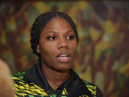 Roxonna McLean,  captain of the national under-21 netball team, at the Norman Manley International Airport on Wednesday, shortly after the players returned home from the Netball World Youth Cup in Gibraltar.