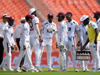 West Indies’ players celebrate the dismissal of India’s captain Shubman Gill on the second day of the first Test at Narendra Modi Stadium in Ahmedabad, India, yesterday.