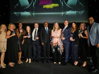 Jamaica’s Tourism Minister Edmund Bartlett (centre) at the Platinum Celebration Awards at the Jamaica Travel Market in London on October 2.