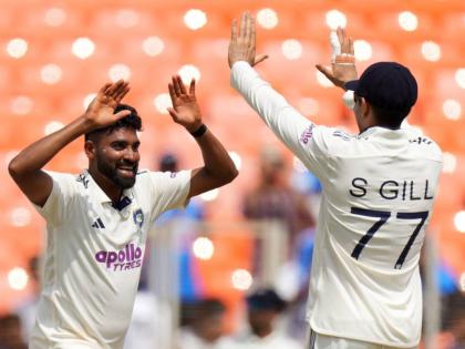 
India’s Mohammed Siraj (left) celebrates with India’s captain Shubman Gill after the dismissal of West Indies’ Justin Greaves on the third day of the first Test cricket match at Narendra Modi Stadium in Ahmedabad, India, yesterday.
