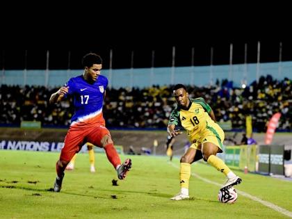 Jamaica’s Tyreek Magee (right) tries to evade the challenge of the United States’ Malik Tillman during a Concacaf Nations League, League A quarter-final match at the National Stadium on November 14, 2024.