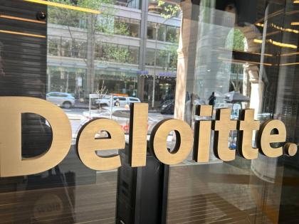 The log of Deloitte is displayed at their office in Melbourne, Australia, on Tuesday, October 7, 2025. (AP Photo/Rod McGuirk)