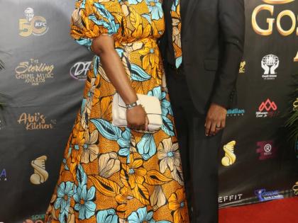 Dr Xaundre Mohansingh matched his wife Zhara-Marie’s dress, pairing a tie patterned from her vibrant floor-length gown with his black suit. 