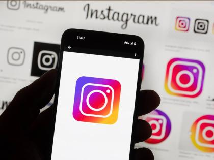 The Instagram logo is seen on a cell phone in Boston, October 14, 2022. (AP Photo/Michael Dwyer, File)