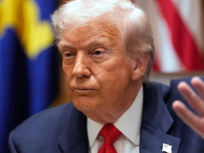 President Donald Trump speaks during a meeting with Argentina's President Javier Milei in the Cabinet Room of the White House, Tuesday, October 14, 2025, in Washington. (AP Photo/Alex Brandon)