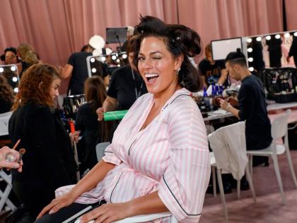 Fashion model Ashley Graham gets ready backstage before the Victoria’s Secret Fashion Show on Wednesday.