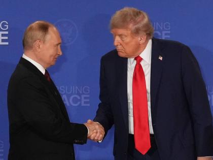 
US President Donald Trump (right) shakes the hand of Russia’s President Vladimir Putin during a joint press conference at Joint Base Elmendorf-Richardson, Alaska, on August 15, 2025.