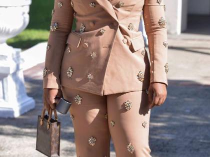 Representing Opposition Leader Mark Golding at the National Honours and Awards on Monday, Nekeisha Burchell, member of parliament for St James Southern, stuns in a nude-tone pantsuit adorned with dazzling embellishments.